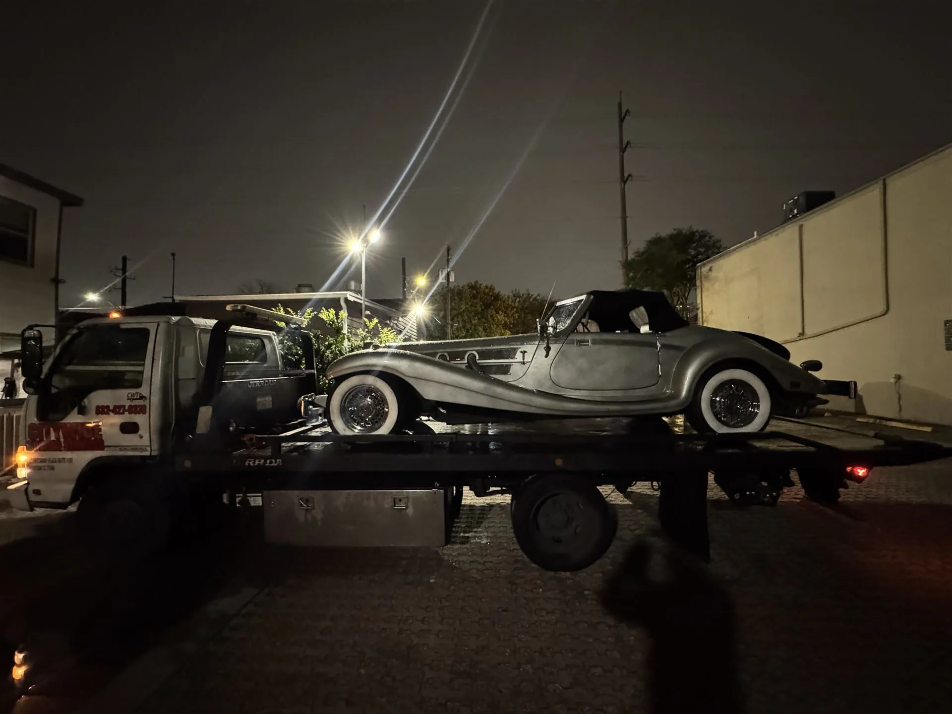 Citywide Towing Services flatbed truck towing a vehicle in Houston, TX