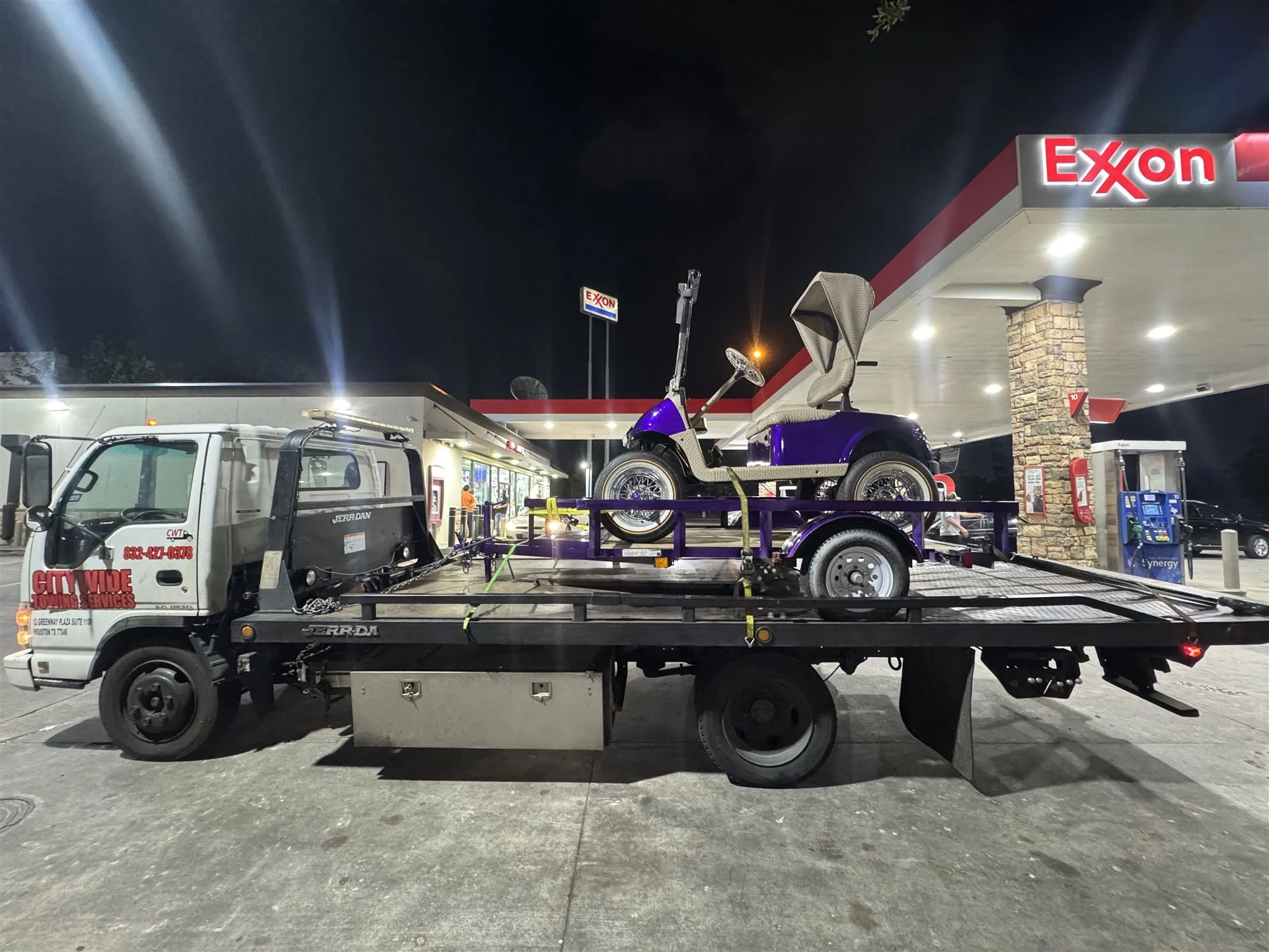 Citywide Towing Services flatbed truck towing a vehicle in Houston, TX